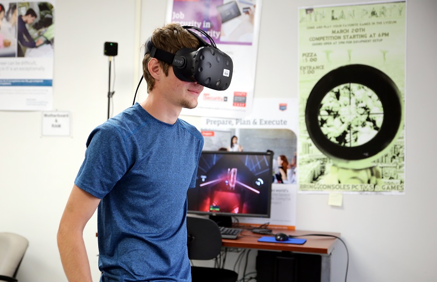 East Mississippi Community College Cyber Security student Karl Mast of Brooksville plays the virtual reality game Beat Saber, which will be among the many games available for play during the college’s LAN party on Sept. 21. East Mississippi Community College Cyber Security student Karl Mast of Brooksville plays the virtual reality game Beat Saber, which will be among the many games available for play during the college’s LAN party on Sept. 21.